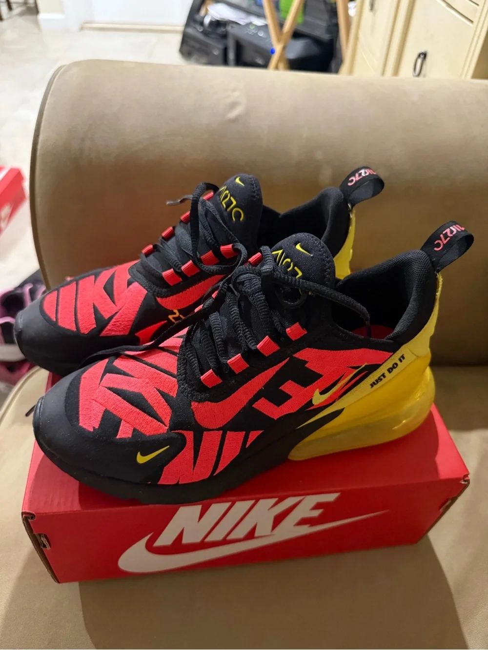 Nike Kids Black and Red Sneakers with Yellow Heel Accent